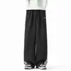 Calça de moletom listrada personalizada/estilo americano, nova coleção de outono, caimento solto, fluida, color blocking, bordada, esportiva, versátil, casual, longa, branca e cinza