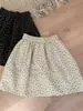 Falda Midi Estampada de Albaricoque Negro Floral Otoño 2026 Moda Cintura Elástica Texturizada Falda con Bolsillos Estilo Coreano de Moda
