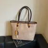 Bolso de hombro texturizado retro transfronterizo 2026, bolsa de mano de gran capacidad para mujer, bolso de mano simple y versátil para el trabajo