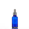 Botella de Vidrio Azul para Aceite Esencial al por Mayor 20ml Botella de Esencia 30ml Botella con Gotero de Punta de Spray Plástica a Prueba de Luz