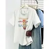 Camiseta de verano de talla grande para mujer, nuevo estilo, estampada, cuello redondo, para chicas de talla grande, adecuada para ir al trabajo y uso casual, manga corta 9845