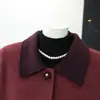 Chaqueta de poliéster estilo chino resistente a las arrugas para mujeres de mediana edad y mayores, colección de otoño moderna y sencilla, nuevo top de mezcla de lana de manga corta con cuello de solapa