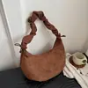 Bolso vintage de gamuza transfronterizo para mujer, nuevo bolso de hombro para el trabajo de nicho otoño 2026, bolso bandolera plisado tipo bola de masa
