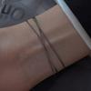 Joyería de moda europea y americana cadena de eslabones de doble capa exquisita pulsera que combina con todo tendencia acero titanio chapado en oro joyería para novias