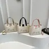 Bolsas Modernas Transfronteiriças para Mulheres Verão 2025 Nova Bolsa de Balde Retro Moderna Transfronteiriça Bolsa Simples de Ombro/Axila