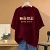 Nova Camiseta Casual Versátil de Algodão Puro de Manga Curta para Mulheres 2026 Gola Redonda Estampada Solta Emagrecedora Tamanho Plus Top