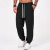 Coleção masculina nova AliExpress transfronteiriça: calças casuais de tecido canelado e sedoso, calças retas de corte solto com listras verticais e bolsos grandes