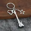 Fornecimento Direto Transfronteiriço Cor de Galvanoplastia de Alta Qualidade Conservação de Cor Pingente de Chaveiro de Guitarra Gota de Óleo Chaveiro de Spice Girls de Nicho Pingente de Bolsa