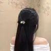 Exclusivo trevo de quatro folhas com strass flash elástico pequeno para cabelo rabo de cavalo moda temperamento corda de cabelo para cabeça bola de alta elasticidade preta para cabelo