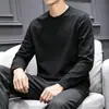 Camiseta casual versátil de manga larga para hombre para otoño, cuello redondo, color liso moderno, cómoda, transpirable y de corte holgado.