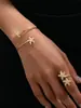 Set de 2 Piezas Estilo Europeo y Americano Estrella de Mar Dorada Vacaciones en la Playa Pulsera y Anillo Versátiles de Personalidad con un Toque de Lujo