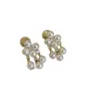 Nuevo Clip para Oreja con Perla de Trébol de Cuatro Hojas y Borla Pequeña Pendientes Elegantes Pendientes Retro de Nicho Pendientes de Lujo Accesible de Gama Alta para Mujer