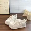 Tênis Branco para Mulheres, Estilo Coreano, Sapatos Casuais Esportivos Versáteis para Estudantes, Tênis de Treino Alemão Respirável, Novo Modelo Outono 2026