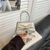 Bolso cruzado casual de moda para el día a día con diseño de lazo, bolso de hombro dulce simple y fresco