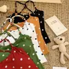 Nueva camisola de estilo americano para mujer con cuello halter de cuentas y estampado de lunares, con copas en el pecho, hermoso diseño en la espalda, corte ajustado y efecto adelgazante