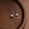 Pendientes de Perla con Aguja de Acero Estilo Lujo Ligero Transfronterizo Europeo y Americano Accesorios para Piercing para Mujeres, Estilo de Nicho de Gama Alta Pendientes de Joyería al por Mayor