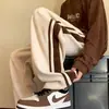 Calça de moda casual esportiva reta de veludo cotelê vintage americana para homens, outono e inverno, modelagem solta, calças de marca da moda