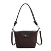 Bolso de ante con estampado de leopardo retro para debajo del brazo para mujer 2026 Nuevo Bolso versátil de un solo hombro cruzado Bolso de mano de nicho tipo dumpling Moderno