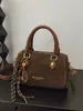 Bolsa de Mão Estilo de Rua Bolsa Boston 2025 Novo Estilo Fashionável Compacta Texturizada Moda Transversal de Ombro para Mulheres