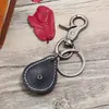 Fabricante de Joyería Simple Venta Directa Estilo Europeo y Americano Transfronterizo Retro Unisex Aleación Cuero Llavero
