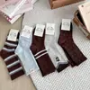 Meias listradas color block estilo coreano para mulheres com cores vintage, etiqueta de tecido listrado Keloqi, bordado de gatinho, meias largas para meninas