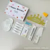 Conjunto de acessórios para bolo Fábrica Ningjin conjunto de sete peças em caixa velas de aniversário chapéu de coroa faca garfo prato de plástico descartável