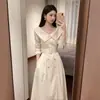 Vestido Branco Elegante de Outono 2026 de Botão Duplo Único Lindo Moderno Estilo Francês Justo Longo