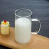 Venta al por mayor de fábrica Taza de agua de gran capacidad engrosada Fácil de limpiar Mango de color Taza con infusor de té Taza de vidrio de borosilicato alto para té verde Taza de vidrio con mango