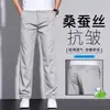 Pantalones casuales de seda italiana de alta gama antiarrugas 2026 verano finos holgados rectos para hombre pantalones de vestir