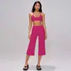 Conjunto de yoga transfronterizo para mujer, con un sujetador deportivo de alta gama, deportivo y absorbente de impactos, y pantalones de yoga de longitud media, ajustados, de secado rápido y de cintura alta.. 5555