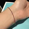 Pulseira Feminina Popular Xiaohongshu de Diamante Completo, Zircônia Vermelho Sangue de Pombo Brilhante Completa, Pulseira de Ano Novo Astrológico com Aparência Sofisticada