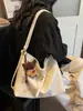 Bolsa Tote Versátil Transfronteiriça para Mulheres 2026 Primavera Nova Tendência Grande Capacidade Estilosa Casual Ombro Transversal