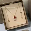 Baojia Versión de Precisión Collar Largo de Falda para Mujer Oro Rosa 18K Nácar Ágata Roja Cadena para Clavícula en Forma de Abanico Dropshipping