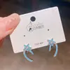 Exquisitos pendientes de estrella de cinco puntas estilo japonés y coreano con pequeños zircones azules, diseño coreano con un toque de lujo ligero