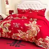 Juego de cuatro piezas de bordado de boda de algodón brillante y amigable con la piel al por mayor, juego de ropa de cama de boda estilo chino