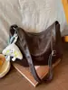 Bolso bandolera de diseño de nicho de alta gama con correa ancha para mujer, nuevo bolso de hombro de moda 2026 para commuting