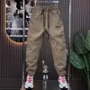 Pantalones deportivos casuales para hombre, versátiles, modernos y cómodos, para primavera y otoño, nuevos, estilo jogger holgado con puños