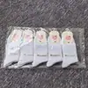 Calcetines de algodón de azúcar de color otoño e invierno para mujer, hasta la pantorrilla, de color liso, deportivos, informales, de estilo universitario japonés.