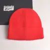2022 nuevo gorro de punto con volantes de color liso para mujer, gorro de invierno de otoño e invierno, gorro de lana cálido de comercio exterior, combina con todo