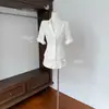 Traje de Camisa Blanca Francesa para Mujer 2026 Moda Nuevo Conjunto de Dos Piezas Falda y Top para Viaje de Verano