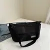 Otoño e Invierno 2025 Nueva Moda Tendencia Estilo Coreano Bolso Cruzado Simple de Nylon Bolso Cuadrado Pequeño Bolso Casual Bolso Cruzado de un Solo Hombro