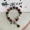 Pulsera de cerámica con hoja de ginkgo nueva pulsera de borla retro china pulsera personalizada para hombre y mujer puesto transmisión en vivo suministro de fábrica