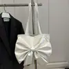 Moderna de Nuevo Estilo Dulce Diseño de Moño Simple 2025 Versión Coreana para Mujer Bolso de Hombro Debajo del Brazo de Gran Capacidad Elegante