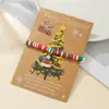 Pulsera de Arcilla Suave Nueva de Navidad Transfronteriza para Mujer, Moda y Versátil con Colgante de Árbol de Navidad Copo de Nieve en Tarjeta de Papel Lista para la Venta