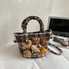 Bolsa de Mão de Boneca Fashion e Fofa para Mulheres Outono e Inverno 2025 Bolsa Saco de Lã Xadrez Grande Capacidade Bolsa Transversal de Celebridade da Internet