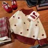 Conjunto de ropa de invierno para niña 2026 nuevo estilo Atuendo de Año Nuevo suéter grueso para bebé pantalones de cuadros coreanos ropa nueva festiva de Año Nuevo