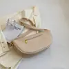 La bolsa popular de este año bolso bandolera de otoño 2023 nuevo vintage color sólido bolsa de albóndiga moda bolso de hombro bajo el brazo