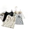 Camisola ajustada para mujer con copas fijas integradas y sujetador acolchado, adecuada para usar en capas o como prenda exterior