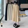 Foto real de falda midi de algodón lavado estilo europeo para mujer de otoño, de cintura alta, con bajo amplio, adecuada para tipo de cuerpo pera, con un efecto de caída que disimula las caderas