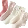 Calcetines de otoño e invierno para mujer, calcetines de felpa con lazo de terciopelo de visón, calcetines lindos y dulces hasta la pantorrilla, engrosados y cálidos, adecuados para el hogar y para dormir